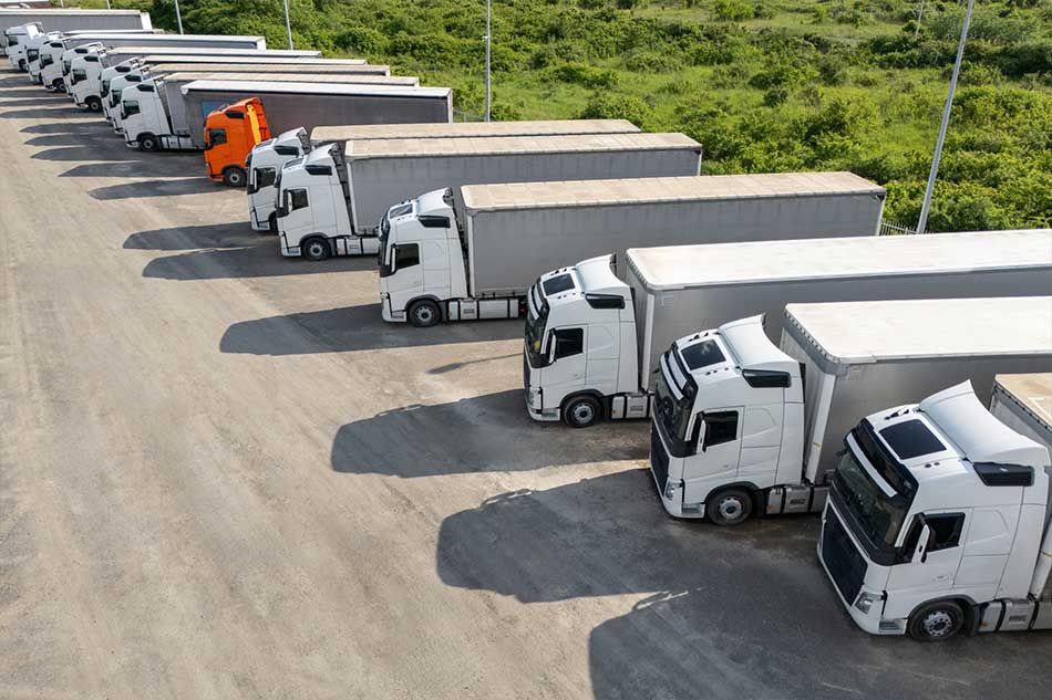 Freight trucks parked at a large-scale logistics and transport yard near Northern Rivers Intermodal in Casino NSW.